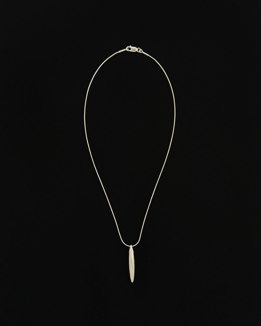 Ina large necklace