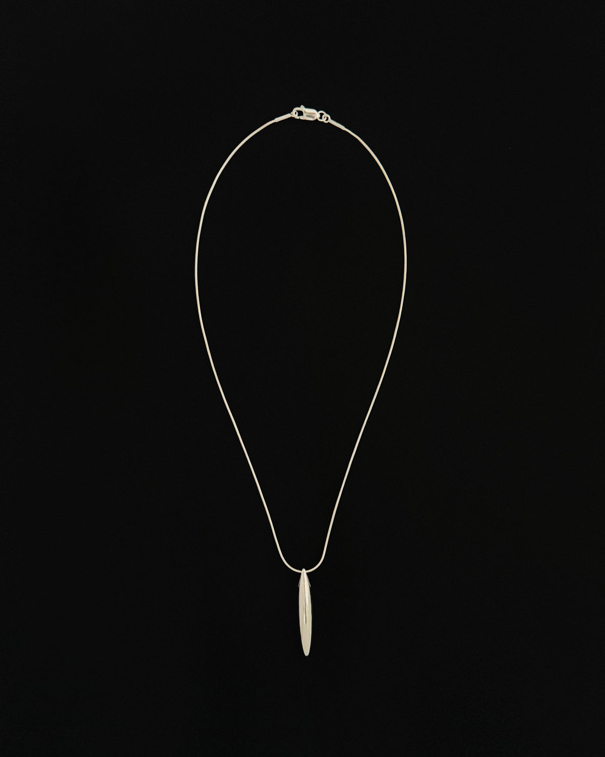 Ina large necklace